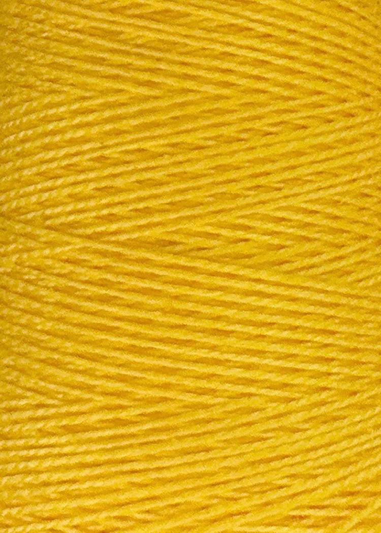 Close-up of yellow 3/2 Looma Circulo Mercerized Pearl Cotton Yarn (Mini Cone) by Circulo, made from 100% cotton and Oeko-Tex certified. Wound tightly in parallel rows, the image showcases the yarn’s detailed texture and fiber strands, highlighting its superior quality and intricate craftsmanship.