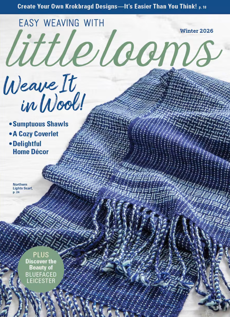 Cover of Easy Weaving with Little Looms, Winter 2026, featuring a blue and white wool yarn scarf with fringe and text highlighting patterns for shawls, coverlets, and home décor.