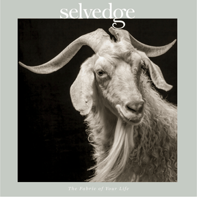 The cover of "Selvedge - Issue 122: Winter White" features a black and white image of a goat with long, curved horns and curly fur to emphasize sustainability, alongside the tagline "The Fabric of Your Life.