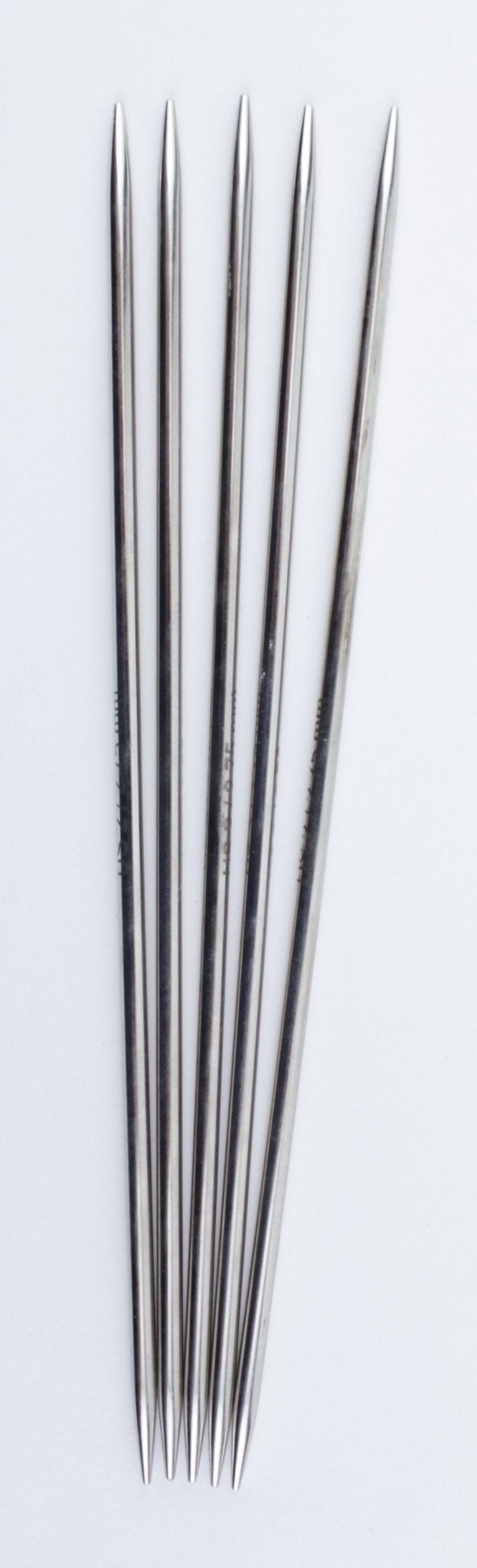 Five Accessories Unlimited Knit Pro Nova Metal Double-Point Knitting Needles, 6 inch, are arranged vertically side by side on a white background to highlight their sleek chrome-plated metal design.