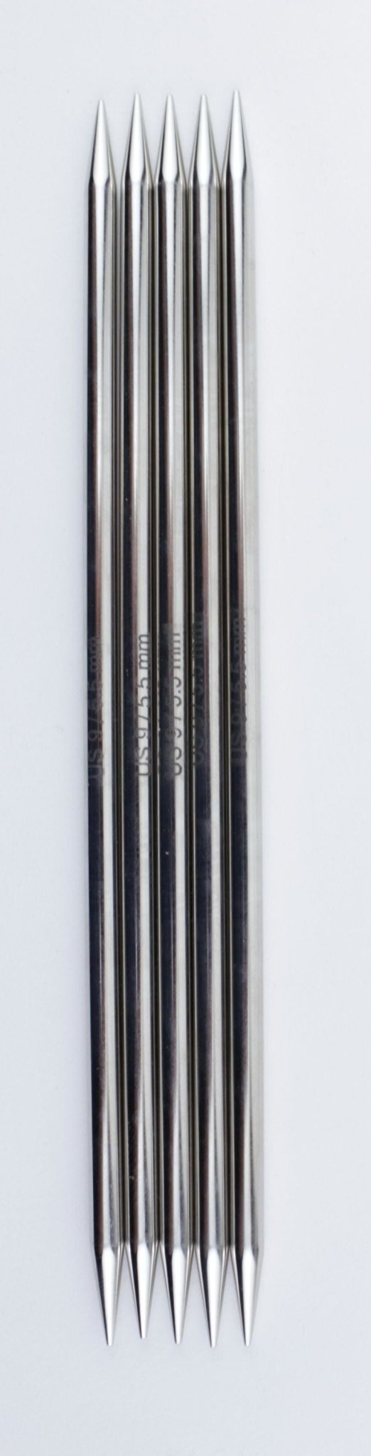 Six Accessories Unlimited Knit Pro Nova Metal Double-Point Knitting Needles (6 inch) are vertically aligned side by side on a white background, with both ends of each chrome needle coming to a sharp point.