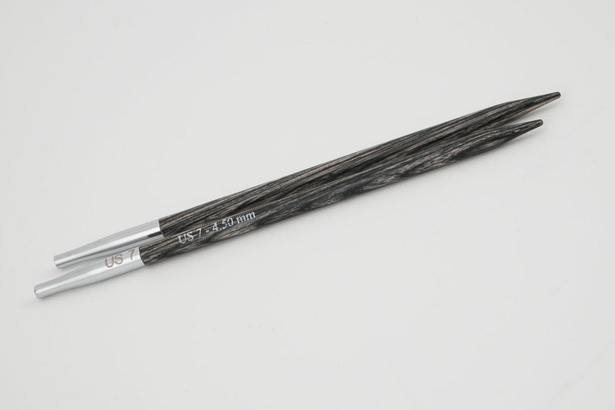 A pair of Accessories Unlimited Knit Pro Dreamz Interchangeable Knitting Needle Tips, US 7 - 4.50 mm with silver metal ends, are lying parallel on a white background.