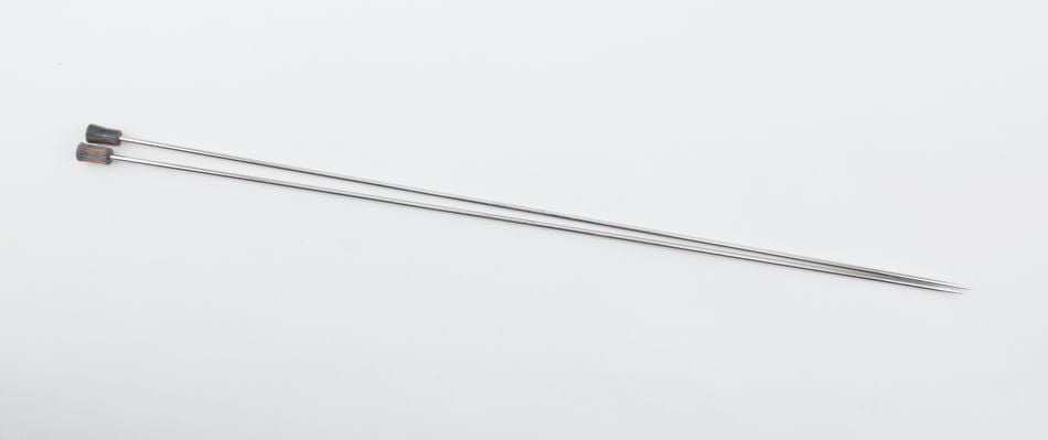 A pair of Accessories Unlimited Knit Pro (Knitters Pride) Nova Metal Single Point Knitting Needles, 10" or 14", with dark caps at one end, are placed parallel on a plain white background.