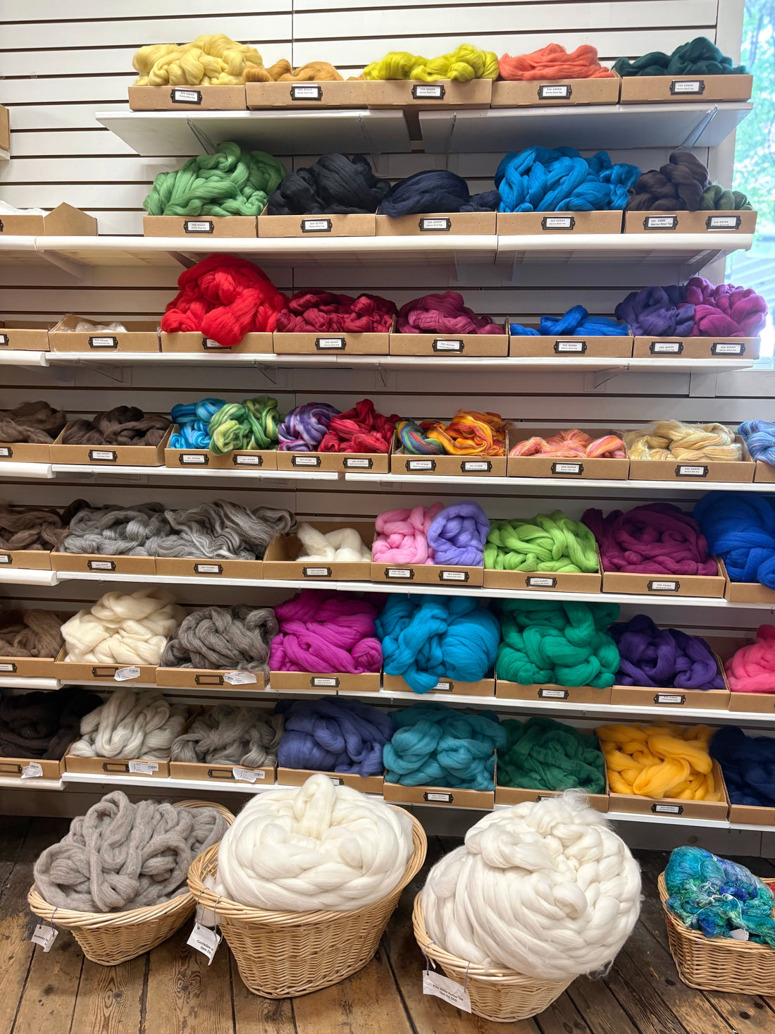 A Grey Day’s Delight: Explore the Wall-O-Fiber at Halcyon Yarn
