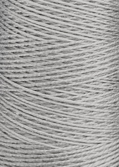 Close-up view of tightly wound white string or twine, showing the detailed texture and overlapping fibers as they wrap around in a cylindrical pattern, reminiscent of premium weaving yarn such as Circulo's 5/2 Looma Circulo Mercerized Pearl Cotton Yarn | Mini Cone.