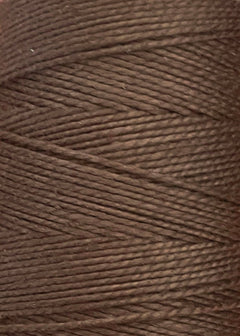 Close-up of a spool of Circulo 5/2 Looma Mercerized Pearl Cotton Yarn Mini Cone in brown, highlighting the tightly wound strands and the texture of the fibers.