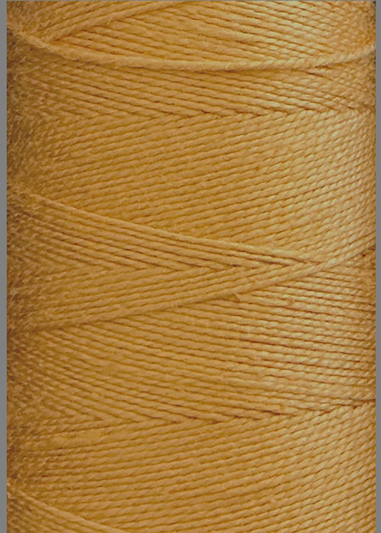 Close-up of a spool of Circulo 5/2 Looma Mercerized Pearl Cotton Yarn | Mini Cone in golden yellow, tightly wound in neat, diagonal layers with a smooth, shiny texture.