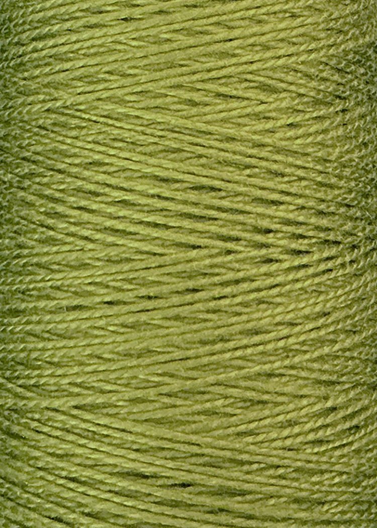 Close-up view of a spool of light green 5/2 Looma Circulo Mercerized Pearl Cotton Yarn | Mini Cone by Circulo, highlighting the detailed texture and diagonal pattern of the tightly wound fibers.