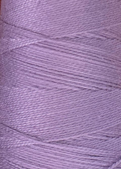 Close-up photo of a spool of Circulo 5/2 Looma Mercerized Pearl Cotton Yarn | Mini Cone in a lavender hue, highlighting the intricate texture and diagonal layering of the fine threads.