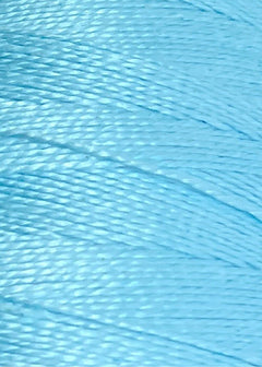 Here’s your rewritten sentence using the provided product data: Close-up of shiny, light blue Circulo 10/2 Looma Circulo Mercerized Pearl Cotton Yarn | Mini Cone labeled 030-2151 Sky at the bottom. The weaving yarn appears smooth and glossy, with a soft texture reminiscent of high-quality pearl cottons.