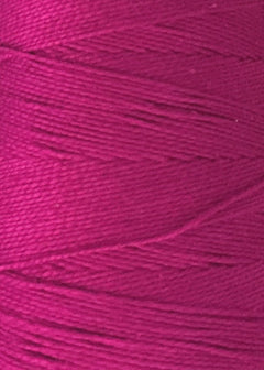 Close-up of magenta-colored 5/2 Looma Circulo Mercerized Pearl Cotton Yarn | Mini Cone by Circulo, tightly wound around a spool to highlight the thread's texture and fine fibers.