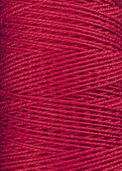 Close-up of Circulo 5/2 Looma Mercerized Pearl Cotton Yarn in red, tightly wound in parallel rows on a mini cone, showcasing the texture and fibrous details of the high-quality thread.