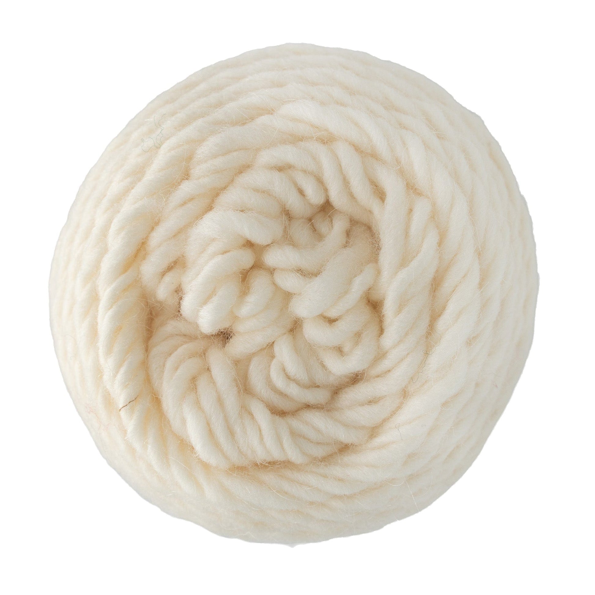 A close-up of a thick, cream-colored Brown Sheep Lambs Pride Worsted Yarn ball with mohair, coiled in a spiral and displayed against a white background.