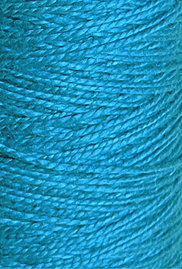 Close-up of tightly wound, bright turquoise 5/2 Looma Circulo Mercerized Pearl Cotton Yarn (Mini Cone) by Circulo, showcasing its smooth texture and fine fibers—ideal for pearl cotton weaving or any project requiring high-quality mercerized cotton yarn.