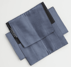 Two blue Lantern Moon Mindy Sleeve pouches by Bryson Distributing, Inc. with black trim overlap on a white background. Visible stitching and seams show quality craftsmanship, and one pouch features a small side label—ideal for needle storage.