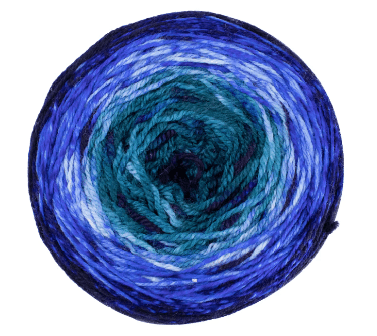 A spherical cake of Malabrigo Sock yarn featuring a variegated pattern of blues, teals, and white.