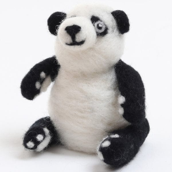 The Ashford Needle Felting Kits by Ashford Handicrafts Limited let you craft a handmade felt panda bear doll with black arms, legs, ears, and a white body, sitting upright and smiling on a white background—ideal for beginners.