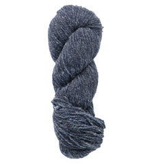 A skein of Bartlettyarns Maine Wool Yarn (Fisherman 2-Ply) in dark blue, heathered and worsted weight, is twisted into a hank and shown on a white background—thick, textured yarn ideal for knitting or crocheting.
