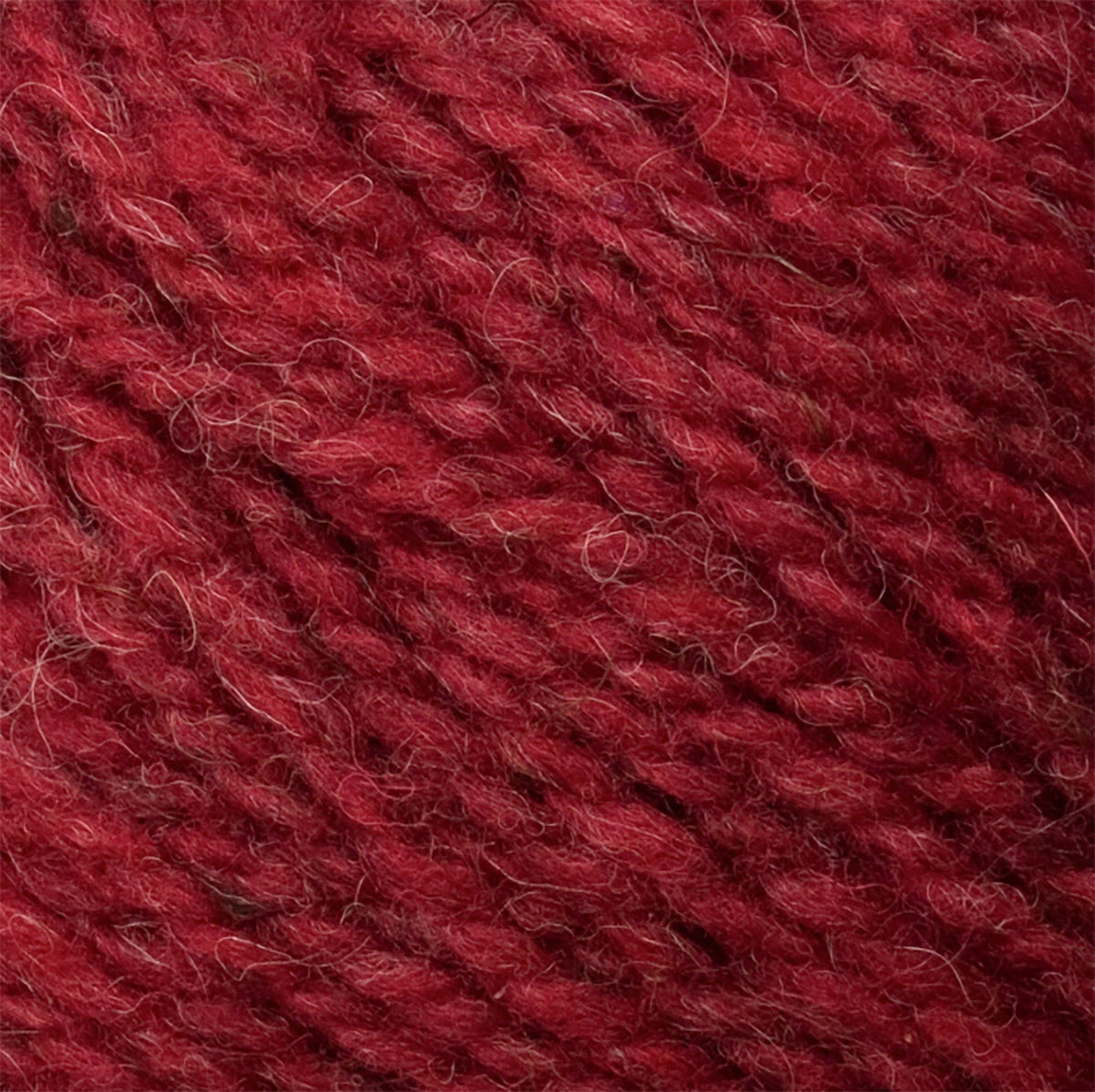 Close-up of Bartlettyarns Maine Wool Yarn (Fisherman 2-Ply) by Bartlettyarns, showcasing its thick, soft worsted weight texture, twisted fibers, and subtle color variations.