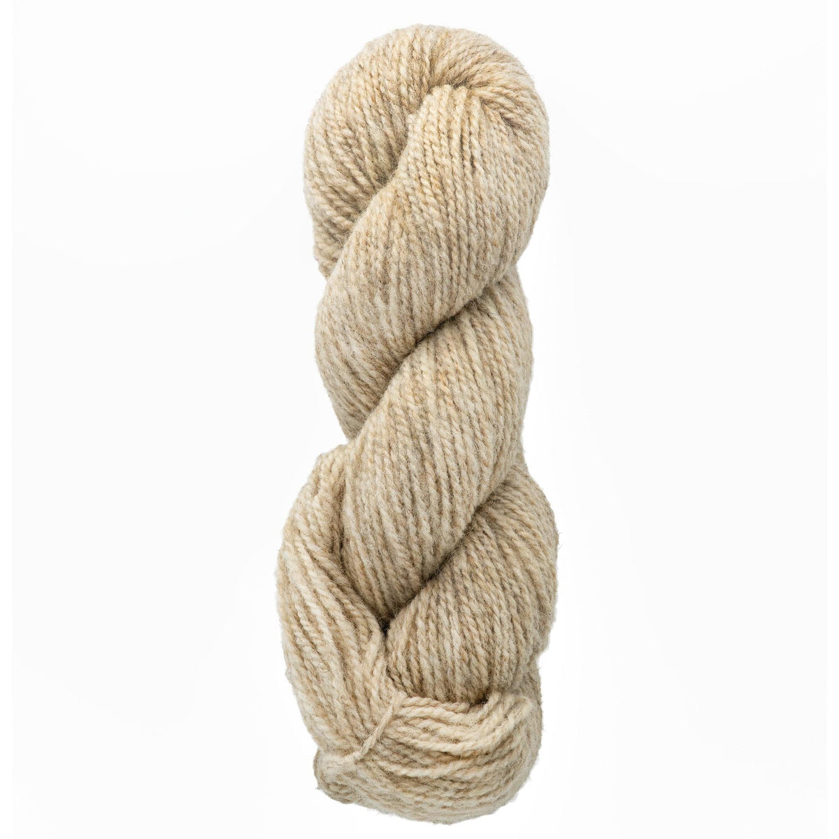 A skein of Bartlettyarns Maine Wool Yarn (Fisherman 2-Ply), a thick beige wool from Bartlettyarns, is twisted into a coil and shown against a plain white background.