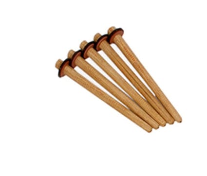 Five wooden golf tees with black rubber rings are arranged in a fan shape, each tee pointing to the right. The background is entirely white, making the tees stand out clearly.