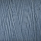 Close-up of light blue, Cotton Carpet Warp 8/4 strands intricately wound together in a crisscross pattern, showcasing a soft, slightly fuzzy texture suitable for colorfast knitting or crocheting projects like cozy rag rugs.