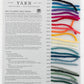 Halcyon Yarn's Classic Rug Wool Sample Cards are ideal for rug makers, featuring a curated palette of 12 wool strands with color numbers and text on yarn specifics like yardage, gauge, and needle sizes.