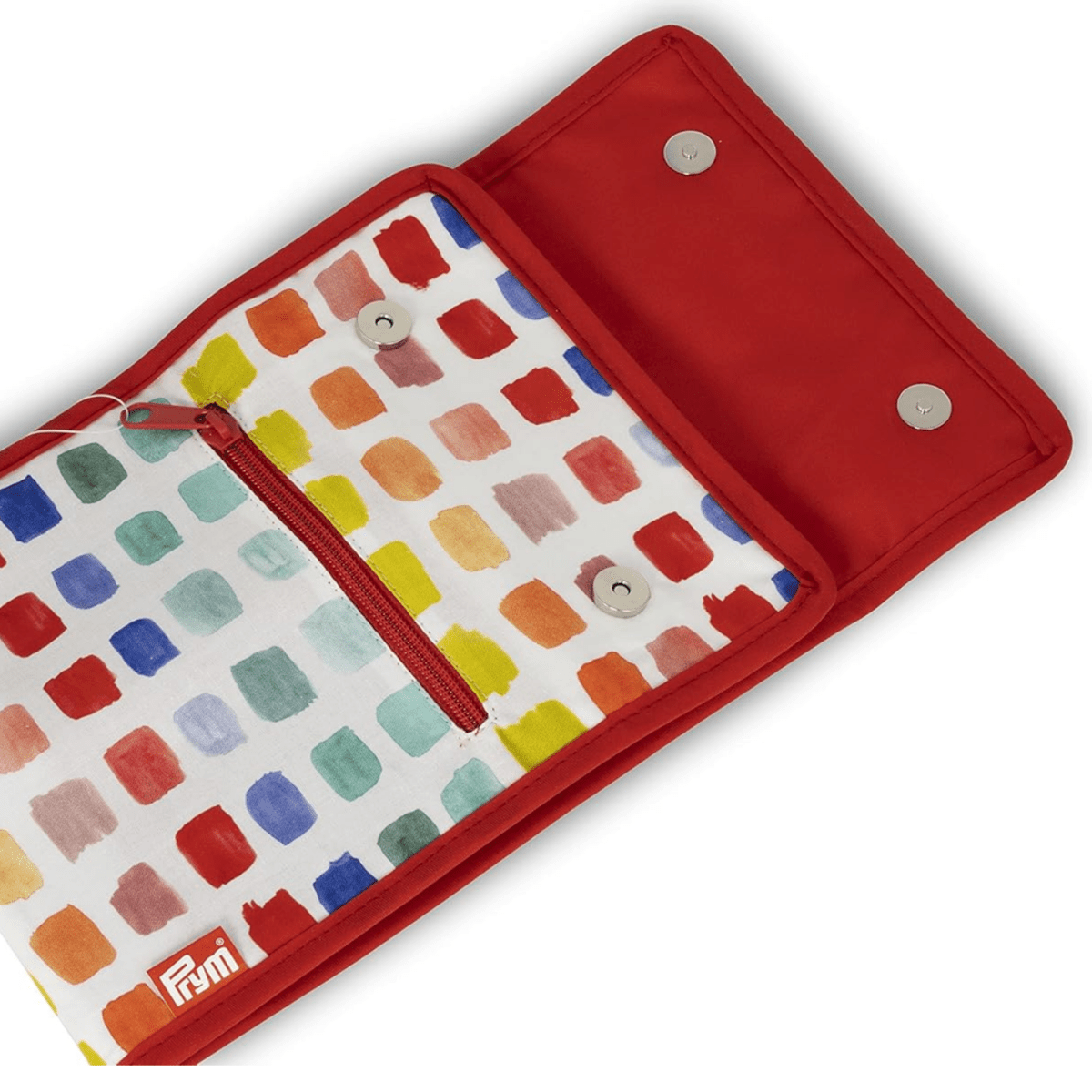 The Bryson Distributing, Inc. Circular Knitting Needle Case is red, foldable with a flap and snap buttons, features a zippered front pocket, and has an interior with a colorful abstract square pattern in blue, red, yellow, and green.