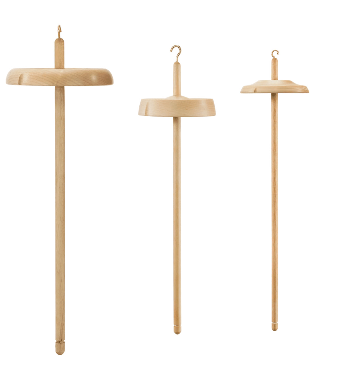 Three Schacht Hi-Lo Drop Spindles by Schacht Spindle Co., each with a top hook and round high- or low-whorl at varying positions along the shaft, displayed against a white background.