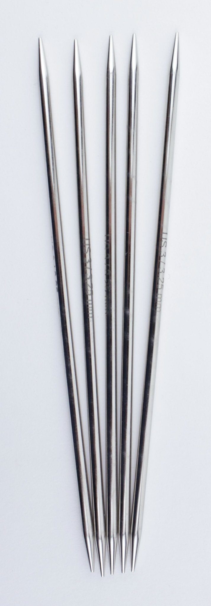 Five Knit Pro Nova Metal Double-Point 6-inch knitting needles by Accessories Unlimited are arranged in a fanned-out pattern on a white background.