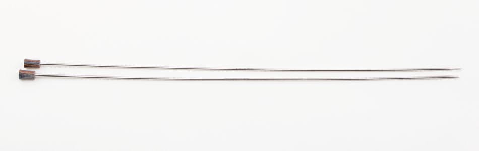 Two Knit Pro (Knitters Pride) Nova Metal Single Point Knitting Needles, 10" or 14", from Accessories Unlimited, with rounded ends and pointed tips, are placed parallel on a white background.
