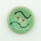 Buttons Etc. Buttons Green Coco Enamel Fa la la Button