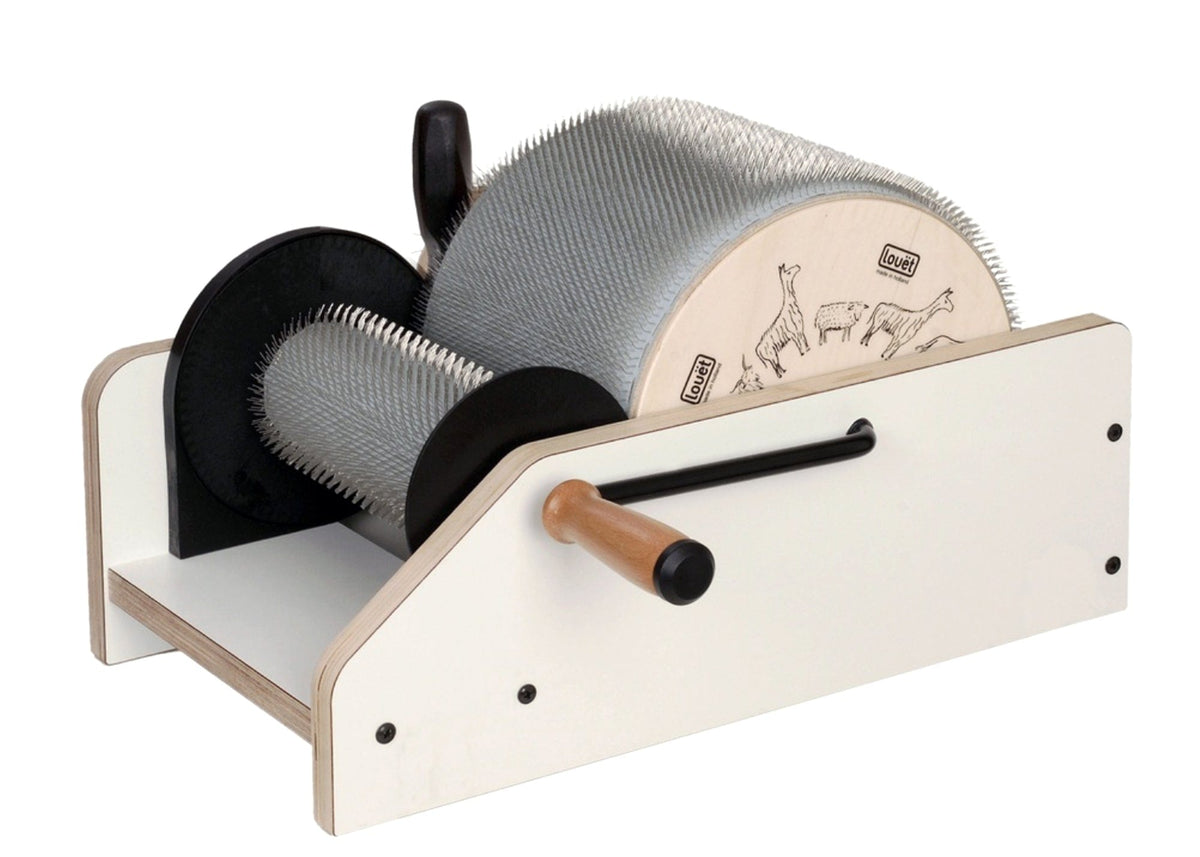 The Louët 8" Classic Drum Carder by Louet Inc. features large and small metal-toothed drums, a handle, alpaca illustrations on the side panel, comes with a doffer brush, and is pictured on a white surface.