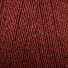 Close-up of Maurice Brassard 8/2 Tencel Yarn | Mini-cone in dark red, featuring tightly wound, smooth, and slightly shiny cellulose fibers—ideal for detailed weaving projects.