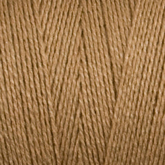 Close-up of light brown 8/2 Tencel Yarn | Mini-cone by Maurice Brassard, showing soft cellulose fibers and parallel strands—ideal texture for detailed weaving projects.