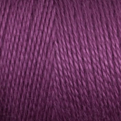 Close-up of tightly wound, purple 8/2 Tencel Yarn | Mini-cone by Maurice Brassard, highlighting its smooth texture and detailed strands—ideal for weaving projects.